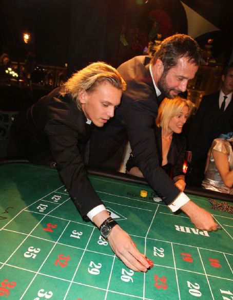 Jamie Campbell-Bower, James Purefoy and Sydney Finch attend Roger Dubuis - Soiree Monegasque at Hotel de Paris on October 20, 2011 in Monaco