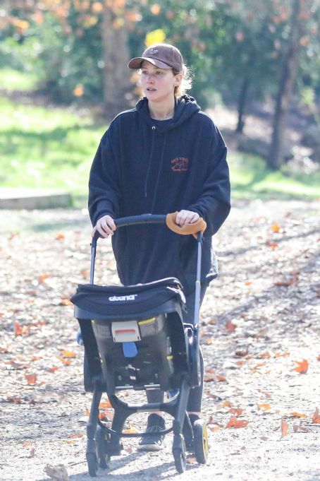 Jennifer Lawrence – With her baby boy visiting a school of ducks at a L.A. lake